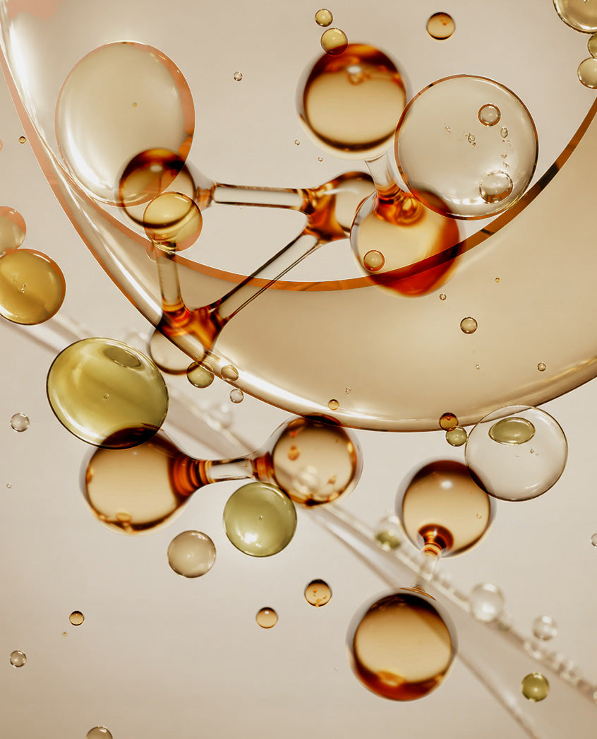 Amber oil droplets suspended in liquid