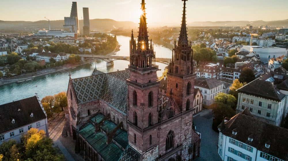 Aerial view of Basel Cathedral and the Rhine in evening light