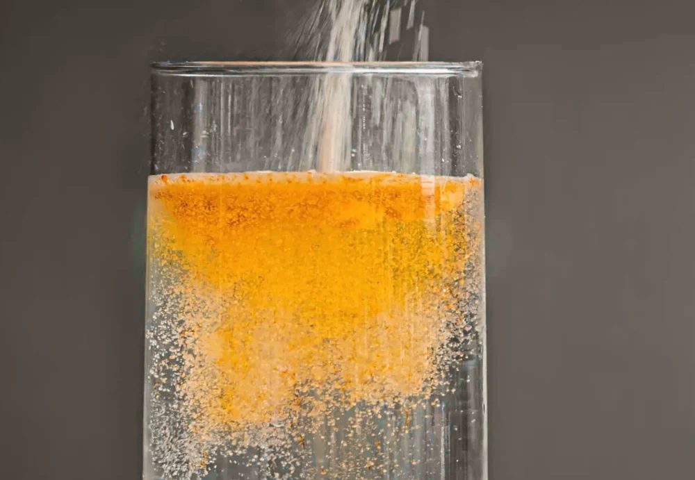 Brain Ritual powder being poured into a glass of water