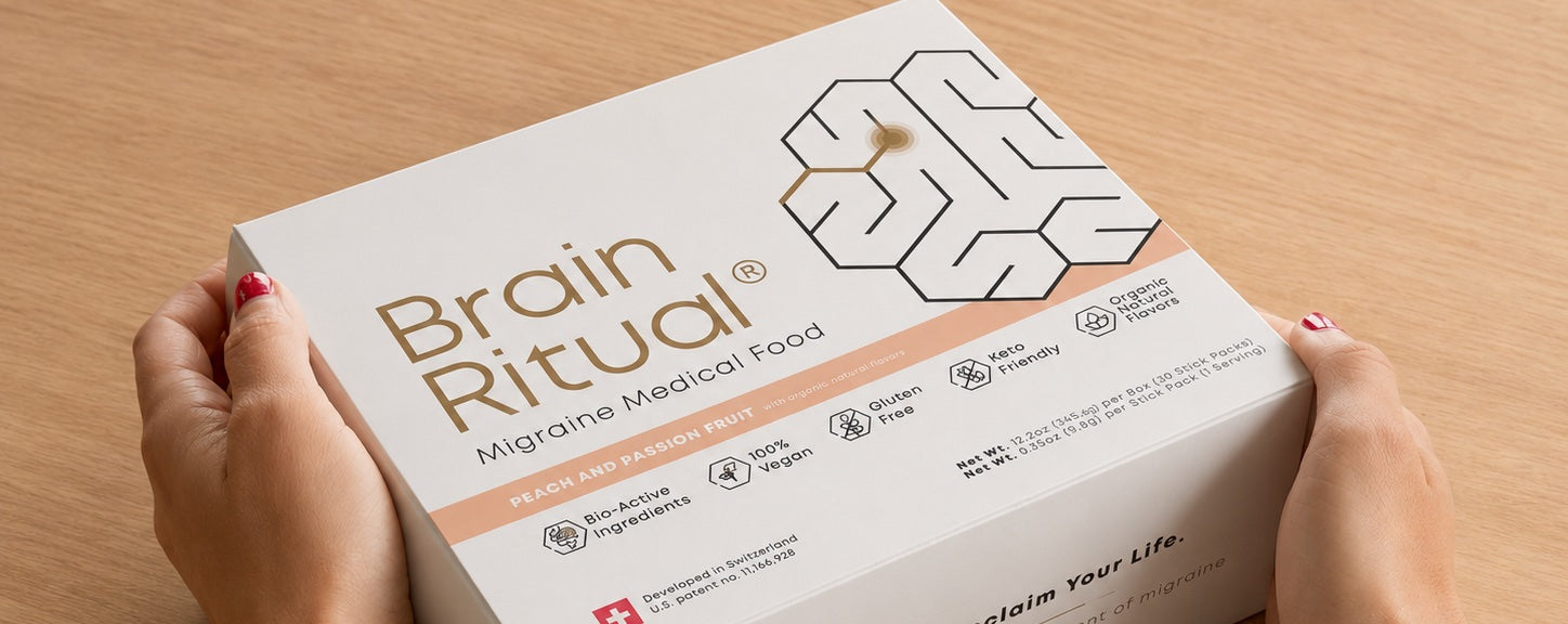 Person holding a Brain Ritual stick pack and product box