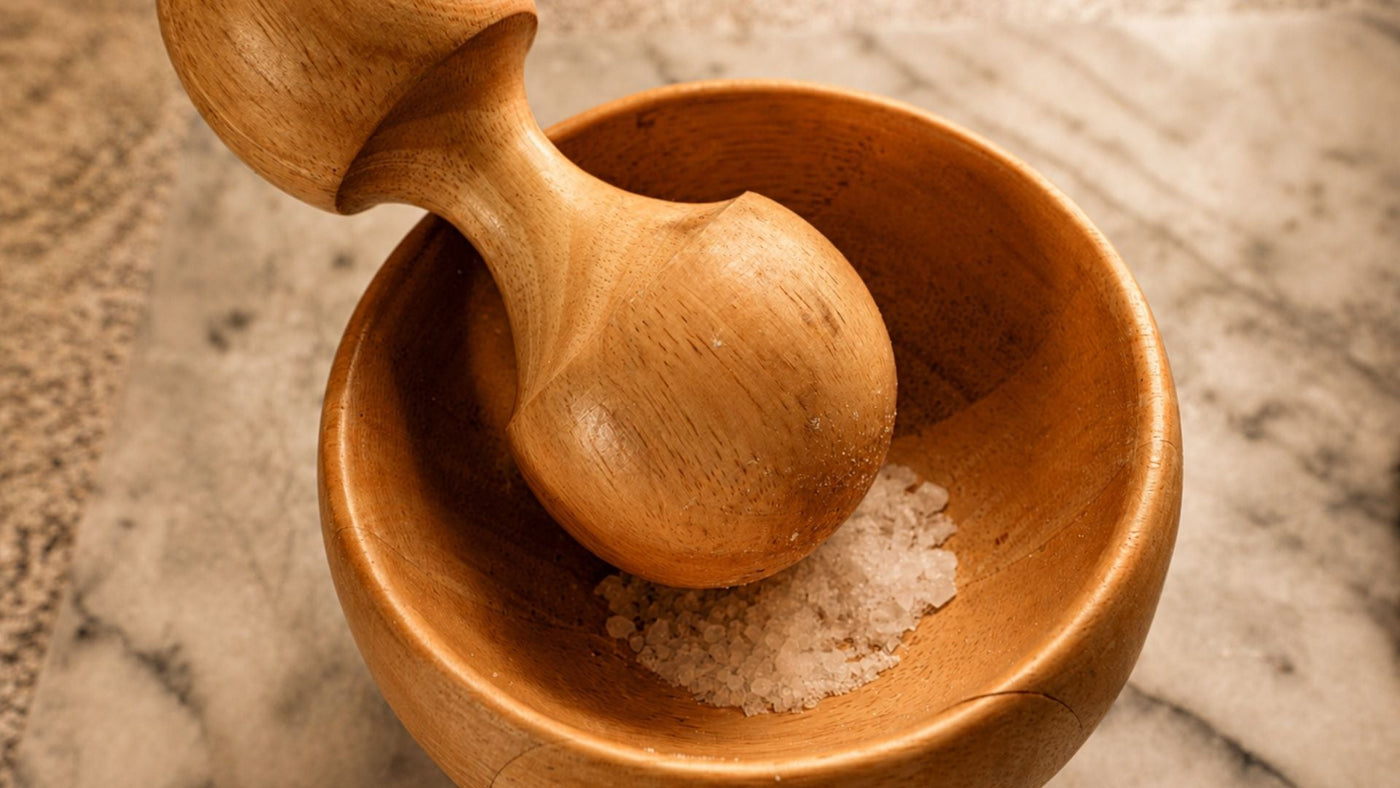 Wooden bowl of Celtic salt for an article on the benefits of Celtic salt for migraines 