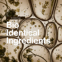 Abstract microscopic liquid texture. Image text reads: No added sugar. Bio-identical ingredients.