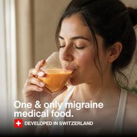 Woman drinking an orange beverage. Image text reads: One and only migraine medical food. Developed in Switzerland.