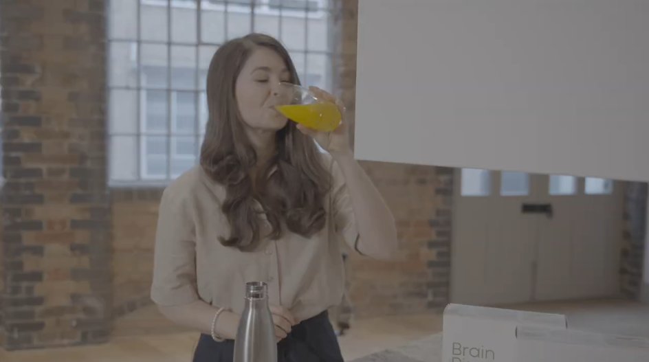 Dr. Elena Gross drinking Brain Ritual in the How to Take Brain Ritual video