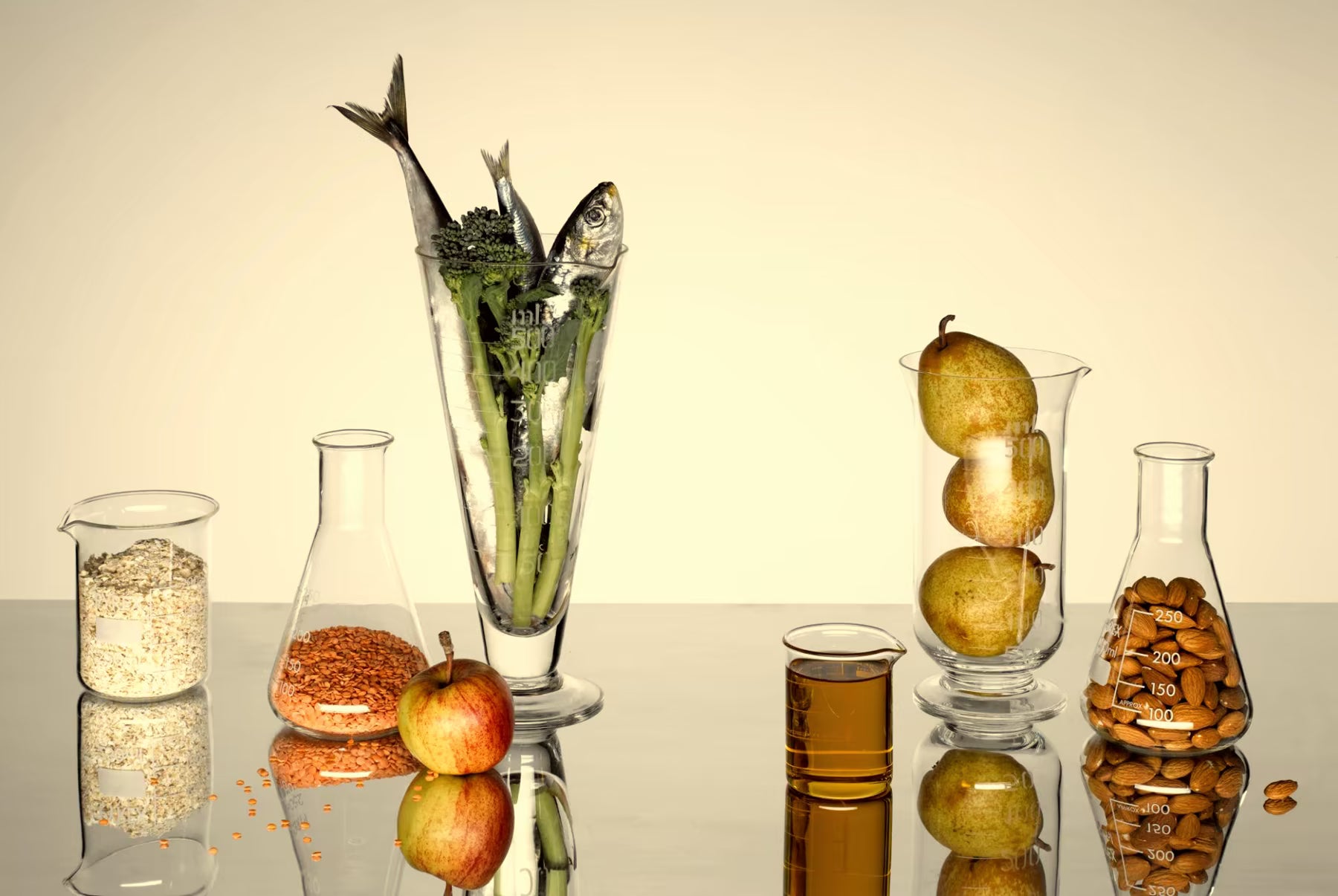 Food ingredients arranged in laboratory glassware